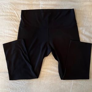 Lululemon WonderUnder High Rise 21 inch black leggings.